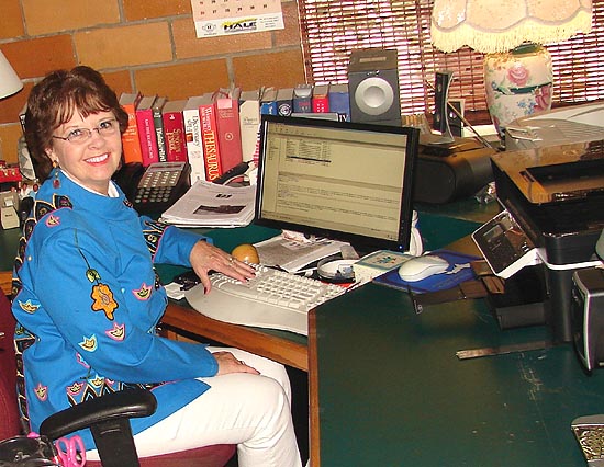 Rosanne at her desk